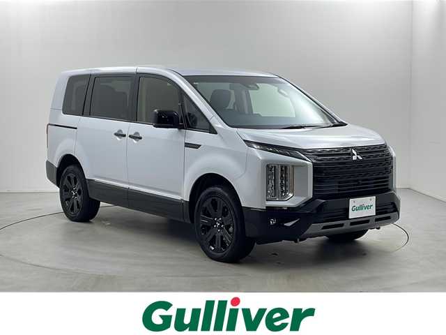 三菱 デリカＤ：５ シャモニー 栃木県 2025(令7)年 0.1千km 白Ⅱ 登録済み未使用車/12.8インチフリップダウンモニター/純正11インチメモリーナビ/ （BT/フルセグTV//CD/DVD/USB/HDMI/FM/AM)/全周囲カメラ/eーAssist/・前方衝突予測警報/・衝突被害軽減ブレーキシステム/・踏み間違い衝突防止アシスト/・車線逸脱警報システム/・車線逸脱防止支援機能/・オートマチックハイビーム/・先行者発進通知/・ふらつき警報/・標識認知/高速道路 同一車線運転支援機能 マイパイロット/レーダークルーズコントロール/ブラインドスポットモニター/両側電動スライドドア/ターボ/４WD/電動リアゲート/パワーシート(D席)/シートヒータ(D/N席)/ステアリングヒーター/パドルシフト/LEDヘッドライト/LEDフォグランプ/18インチ純正アルミホイール/アイドリングストップ/プッシュスタート/カーテンエアバッグ/スマートキー×2本/保証書、取扱説明書