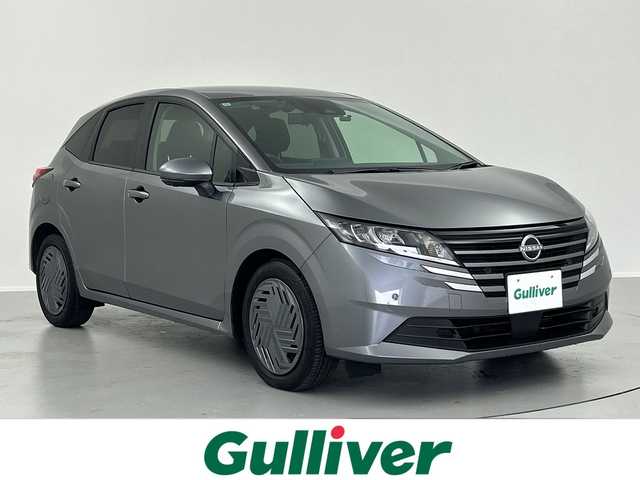 日産 ノート X 福島県 2024(令6)年 0.8万km ダークメタルグレー ●純正ディスプレイオーディオ/●全方位カメラ/●エマージェンシーブレーキ/●車線逸脱防止支援/●前後コーナーセンサー/●ブラインドスポットモニター/●電動パーキングブレーキ/●LEDヘッドライト/●オートライト/●オートマチックハイビーム/●ステアリングスイッチ/●電動格納ウインカーミラー/●ETC/●純正フロアマット/●前方ドライブレコーダー/●レベライザー/●プッシュスタート/●スマートキー/●スペアキー1本/●W+サイド＋ニーSRS+ABS/●保証書/●取扱説明書