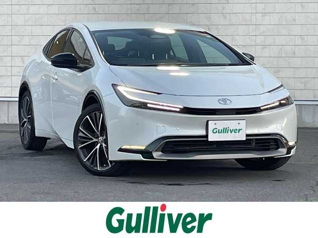 トヨタ プリウス Z 群馬県 2023(令5)年 8.8万km プラチナホワイトパールマイカ 純正ナビ付１２．３型ディスプレイ　/フルセグ　/全周囲カメラ　/黒レザーシート　/前席エアシート・シートヒーター　/１００Ｖ充電　/Ｍｉｒａｃａｓｔ　/デジタルミラー　/ＢＳＭ　/純正１９インチＡＷ　/純正フロアマット/Bluetooth/AHB/LEDヘッドライト/D席パワーシート/純正ビルトインETC2.0/アダプティブクルーズコントロール/シートセットポジションメモリー/スマートキー/パワーステアリング