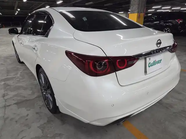 日産 スカイライン 400R 長崎県 2020(令2)年 9万km ブリリアントホワイトパール ワンオーナー/サンルーフ/BOSEパフォーマンスサウンド/純正8型ナビ/フルセグTV/アラウンドビューモニター/ビルトインETC/前後ドライブレコーダー/レーダークルーズコントロール/フロント/バックソナー/全方位運転支援システム/・衝突被害軽減ブレーキ/・車線逸脱防止支援システム/・車間距離維持支援システム/・前後誤発進抑制機能/ツインターボ/LEDヘッドランプ/革巻きステアリング/パドルシフト/ブラック革シート/前席パワーシート/純正19インチアルミホイール/レッドブレーキキャリパー/スマートキー/プッシュエンジンスターター/禁煙車