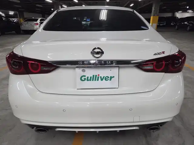 日産 スカイライン 400R 長崎県 2020(令2)年 9万km ブリリアントホワイトパール ワンオーナー/サンルーフ/BOSEパフォーマンスサウンド/純正8型ナビ/フルセグTV/アラウンドビューモニター/ビルトインETC/前後ドライブレコーダー/レーダークルーズコントロール/フロント/バックソナー/全方位運転支援システム/・衝突被害軽減ブレーキ/・車線逸脱防止支援システム/・車間距離維持支援システム/・前後誤発進抑制機能/ツインターボ/LEDヘッドランプ/革巻きステアリング/パドルシフト/ブラック革シート/前席パワーシート/純正19インチアルミホイール/レッドブレーキキャリパー/スマートキー/プッシュエンジンスターター/禁煙車