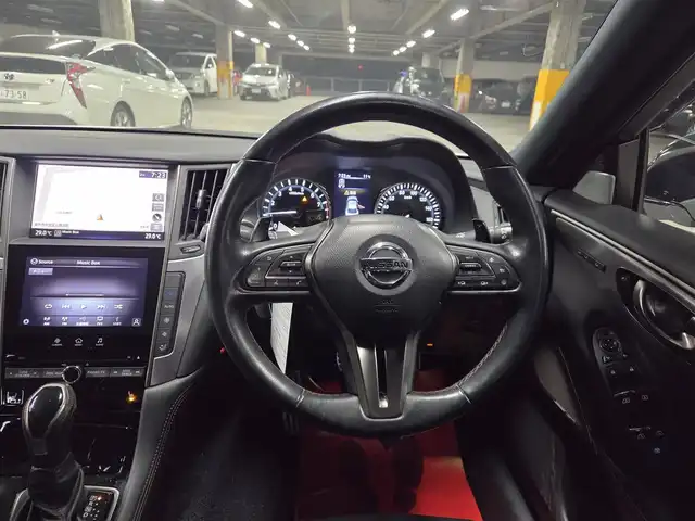 日産 スカイライン 400R 長崎県 2020(令2)年 9万km ブリリアントホワイトパール ワンオーナー/サンルーフ/BOSEパフォーマンスサウンド/純正8型ナビ/フルセグTV/アラウンドビューモニター/ビルトインETC/前後ドライブレコーダー/レーダークルーズコントロール/フロント/バックソナー/全方位運転支援システム/・衝突被害軽減ブレーキ/・車線逸脱防止支援システム/・車間距離維持支援システム/・前後誤発進抑制機能/ツインターボ/LEDヘッドランプ/革巻きステアリング/パドルシフト/ブラック革シート/前席パワーシート/純正19インチアルミホイール/レッドブレーキキャリパー/スマートキー/プッシュエンジンスターター/禁煙車