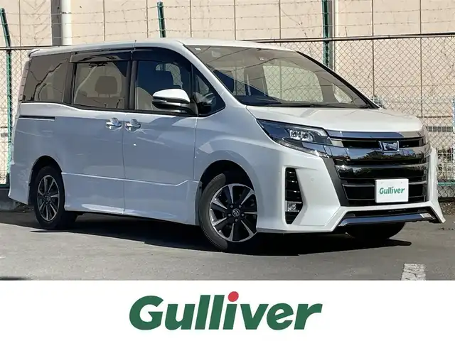 トヨタ ノア Si ダブルバイビーⅡ 東京都 2019(令1)年 5万km ホワイトパールクリスタルシャイン 純正大型ナビ/(CD/DVD/フルセグ/BT/USB)/純正後席モニター/バックカメラ/両側電動スライドドア/前方ドライブレコーダー/ビルトインＥＴＣ/クルーズコントロール/衝突軽減ブレーキ/コーナーセンサー（前/後）/レーンキープアシスト/ＬＥＤヘッドライト/オートハイビーム/フォグランプ/純正フロアマット/純正サイドバイザー/レーダー探知機/シートカバー/スマートキ