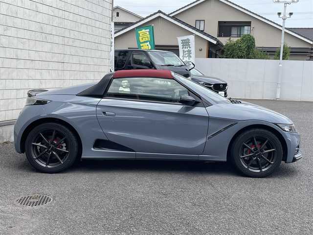 ホンダ Ｓ６６０ モデューロX バージョンZ 大分県 2021(令3)年 1.6万km ソニックグレーパール ワンオーナー/Spoonマフラー/赤黒ハーフレザーシート/純正オンダッシュナビ VXU-192SSi/【ワンセグ/BTオーディオ/USB】/バックカメラ/純正アルミホイール (F:15インチ R:16インチ)/シティブレーキアクティブシステム/クルーズコントロール/純正5段階減衰力調整機構付サスペンション/アクティブスポイラー/ボルドーレッドロールトップ/ブラックエンブレム/カーボン調インテリアパネル/ドアライニングパネル/シートセンターバッグ/前後2カメラREC機能付デジタルインナーミラー/イルミネーション付スカッフプレート/ETC/LEDヘッドライト/LEDフォグランプ/オートライト/赤レザー&アルカンターラコンビステアリング/ステアリングスイッチ/チルトステアリング/シートヒーター/ウインカーミラー/横滑り防止装置/フロアマット/電動調整ミラー/サイド&Wエアバッグ/電子制御制動力配分システム付ABS/スマートキー×2/保証書/車両取説/ナビ取説
