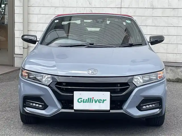ホンダ Ｓ６６０ モデューロX バージョンZ 大分県 2021(令3)年 1.6万km ソニックグレーパール ワンオーナー/Spoonマフラー/赤黒ハーフレザーシート/純正オンダッシュナビ VXU-192SSi/【ワンセグ/BTオーディオ/USB】/バックカメラ/純正アルミホイール (F:15インチ R:16インチ)/シティブレーキアクティブシステム/クルーズコントロール/純正5段階減衰力調整機構付サスペンション/アクティブスポイラー/ボルドーレッドロールトップ/ブラックエンブレム/カーボン調インテリアパネル/ドアライニングパネル/シートセンターバッグ/前後2カメラREC機能付デジタルインナーミラー/イルミネーション付スカッフプレート/ETC/LEDヘッドライト/LEDフォグランプ/オートライト/赤レザー&アルカンターラコンビステアリング/ステアリングスイッチ/チルトステアリング/シートヒーター/ウインカーミラー/横滑り防止装置/フロアマット/電動調整ミラー/サイド&Wエアバッグ/電子制御制動力配分システム付ABS/スマートキー×2/保証書/車両取説/ナビ取説