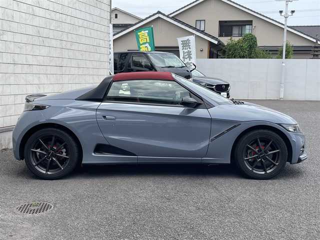 ホンダ Ｓ６６０ モデューロX バージョンZ 大分県 2021(令3)年 1.6万km ソニックグレーパール ワンオーナー/Spoonマフラー/赤黒ハーフレザーシート/純正オンダッシュナビ VXU-192SSi/【ワンセグ/BTオーディオ/USB】/バックカメラ/純正アルミホイール (F:15インチ R:16インチ)/シティブレーキアクティブシステム/クルーズコントロール/純正5段階減衰力調整機構付サスペンション/アクティブスポイラー/ボルドーレッドロールトップ/ブラックエンブレム/カーボン調インテリアパネル/ドアライニングパネル/シートセンターバッグ/前後2カメラREC機能付デジタルインナーミラー/イルミネーション付スカッフプレート/ETC/LEDヘッドライト/LEDフォグランプ/オートライト/赤レザー&アルカンターラコンビステアリング/ステアリングスイッチ/チルトステアリング/シートヒーター/ウインカーミラー/横滑り防止装置/フロアマット/電動調整ミラー/サイド&Wエアバッグ/電子制御制動力配分システム付ABS/スマートキー×2/保証書/車両取説/ナビ取説