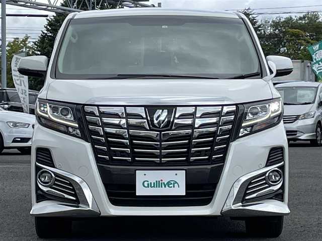 トヨタ アルファード SA Cパッケージ 道央・札幌 2016(平28)年 3.1万km ホワイトパールクリスタルシャイン ４WD/ワンオーナー/寒冷地仕様/JBLプレミアムサウンドシステム/純正メーカーナビ/CD/DVD/BD/BT/フルセグ/純正フリップダウンモニター/トヨタセーフティセンス/プリクラッシュセーフティ/横滑り防止装置/レーダークルーズコントロール/パーキングアシスト/クリアランスソナー/バックカメラ/ビルトインETC/ワイパーデアイサー/両側パワースライドドア/パワーバックドア/前席/２列目パワーシート/D席メモリーシート/前席シートヒーター/N席/２列目オットマン/レザーシート/革巻きウッドコンビステアリング/ステアリングリモコン/ハンドルヒーター/AC100V/置くだけ充電/電動パーキング/ブレーキホールド/自動防眩ミラー/MTモード付AT/プッシュスタート/スマートキー/LEDヘッドライト/オートライト/オートハイビーム/フォグランプ/電動格納ミラー/ウィンカーミラー/純正フロアマット/ドアバイザー/スペアキー