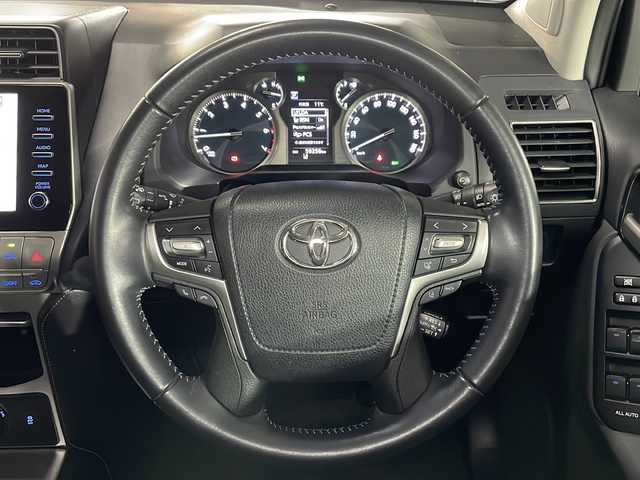 トヨタ ランドクルーザー プラド TX Lパッケージ 広島県 2020(令2)年 6万km ブラック メーカー9型ディスプレイオーディオ/（メモリナビ/フルセグTV/AppleCarPlay/AndroidAuto）/パノラミックビューモニター/OP19インチAW/ルーフレール/黒革シート/パワーシート/シートヒーター/ベンチレーション/トランスファーレバー/セーフティンセンス/・プリクラッシュセーフティ/・レーンディパーチャーアラート/・オートマチックハイビーム/・レーダークルーズコントロール/ブラインドスポットモニター/クリアランスソナー/LEDヘッドランプ/ETC2.0/USB入力端子