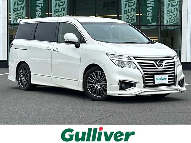 日産 エルグランド 250HWS プレミアム アーバンクロム 岡山県 2015(平27)年 5.2万km ブリリアントホワイトパール 純正メモリーナビ/バックカメラ　/純正フリップダウンモニター　/デジタルインナーミラー　/両側パワースライドドア　/ＩＭＰＡＬエアロ　/メモリー付パワーシート　/シートヒーター　/オットマン　/スマートキー　/ＥＴＣ/プッシュスタート/オートライト