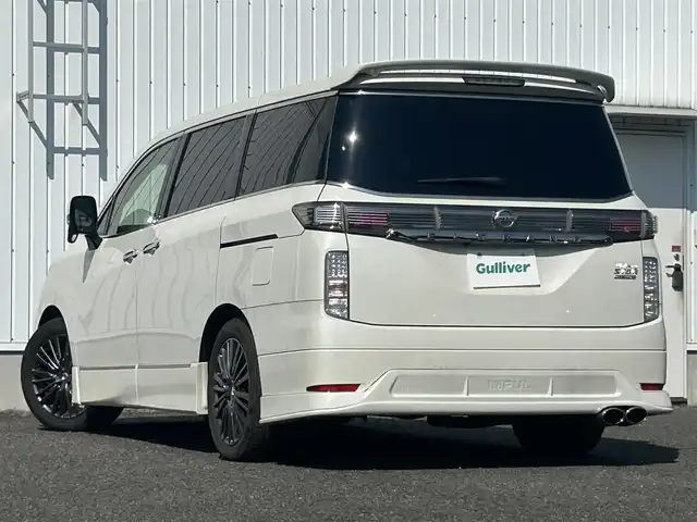 日産 エルグランド 250HWS プレミアム アーバンクロム 熊本県 2015(平27)年 5.2万km ブリリアントホワイトパール 純正メモリーナビ/バックカメラ　/純正フリップダウンモニター　/デジタルインナーミラー　/両側パワースライドドア　/ＩＭＰＡＬエアロ　/メモリー付パワーシート　/シートヒーター　/オットマン　/スマートキー　/ＥＴＣ/プッシュスタート/オートライト