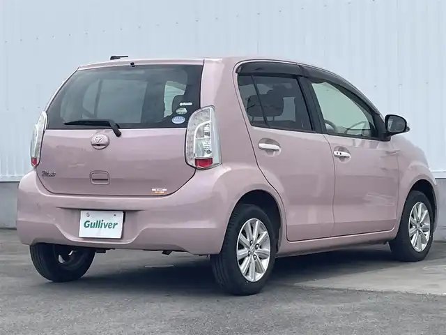 トヨタ パッソ プラスハナ Gパッケージ 愛媛県 2015(平27)年 7.7万km ムースピンクP 純正ナビ　/AM/FM/CD/DVD/BT/フルセグTV　/バックカメラ　/アイドリングストップ　/ドライブレコーダー　/横滑り防止装置　/ヘッドライトレベライザー　/電格ミラー　/シガーソケット　/ETC/現状サマー(純正AW)(165/65/R14)