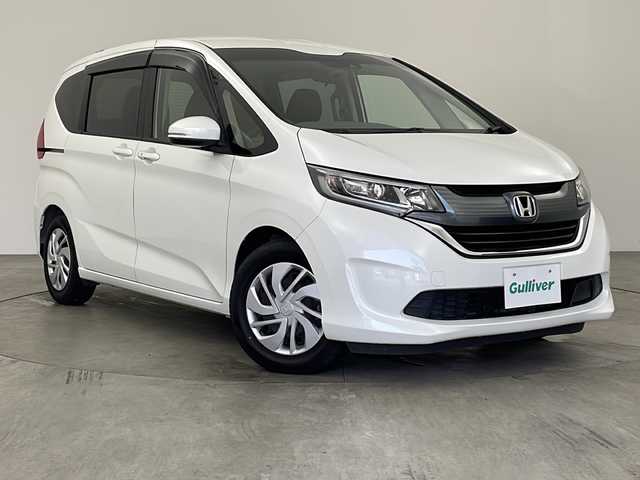 ホンダ フリード G ホンダセンシング 兵庫県 2018(平30)年 6.1万km ホワイトオーキッドパール ・純正ナビ＆TV＆BT＆DVD/・バックカメラ/・両側パワースライドドア/・衝突軽減ブレーキ/・レーンキープアシスト/・レーダークルーズコントロール/・誤発進抑制機能/・プラズマクラスター/・前方ドライブレコーダー/・スマートキー/・プッシュスタート/・純正ビルトインETC/・コンフォートビュー/・ドアミラーヒーター/・フロントワイパーデアイサー/・フロアマット/・LEDヘッドライト/・オートライト/・アイドリングストップ/・横滑り防止装置