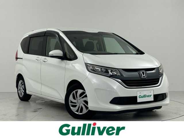 ホンダ フリード G ホンダセンシング 大阪府 2018(平30)年 6.1万km ホワイトオーキッドパール ホンダセンシング/　・衝突軽減ブレーキ/　・レーンキープアシスト/　・レーダークルーズコントロール/　・誤発進抑制機能/純正メモリナビ/　CD/DVD/Bluetooth/TV/バックカメラ/LEDヘッドライト/オートライト/プラズマクラスター/スマートキー/プッシュスタート/ビルトインETC/ドアミラーヒーター/純正フロアマット/アイドリングストップ/横滑り防止装置