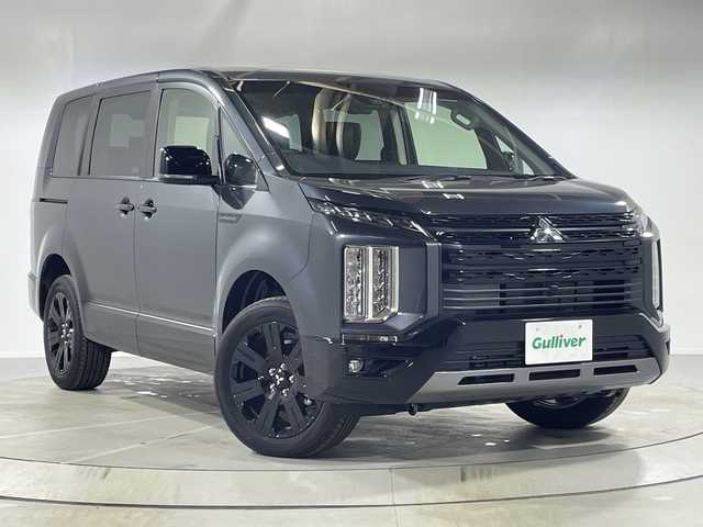 三菱 デリカＤ：５ シャモニー 神奈川県 2025(令7)年 0.1千km グラファイトグレーメタリック/ブラックマイカ 登録済未使用車/CHAMONIX (8人)/ステップレス/4WD/オリジナルナビ取付パッケージ＋リアモニター取付パッケージ(25/300)/D:5専用11型ナビゲーション(322300)/社外11型ナビ(EX11NX)/(CD/DVD/SD/MSV/BT/HDMI/フルセグTV/CarPlay)/マルチアラウンドモニター/12.8型後席用モニター(143550円)/e-Assist/BSM/アダプティブクルーズコントロール/オートマチックハイビーム/両側パワースライドドア/パワーバックドア/半革シート/前席シートヒーター/ステアリングヒーター/電動パーキングブレーキ/AC100V/プッシュスタート/スマートキー/LEDライト/オートライト/純正18インチアルミホイール