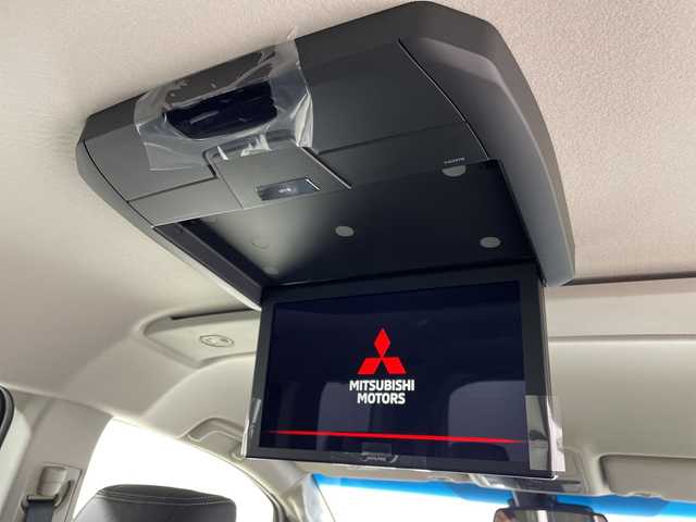 三菱 デリカＤ：５ シャモニー 神奈川県 2025(令7)年 0.1千km グラファイトグレーメタリック/ブラックマイカ 登録済未使用車/CHAMONIX (8人)/ステップレス/4WD/オリジナルナビ取付パッケージ＋リアモニター取付パッケージ(25/300)/D:5専用11型ナビゲーション(322300)/社外11型ナビ(EX11NX)/(CD/DVD/SD/MSV/BT/HDMI/フルセグTV/CarPlay)/マルチアラウンドモニター/12.8型後席用モニター(143550円)/e-Assist/BSM/アダプティブクルーズコントロール/オートマチックハイビーム/両側パワースライドドア/パワーバックドア/半革シート/前席シートヒーター/ステアリングヒーター/電動パーキングブレーキ/AC100V/プッシュスタート/スマートキー/LEDライト/オートライト/純正18インチアルミホイール