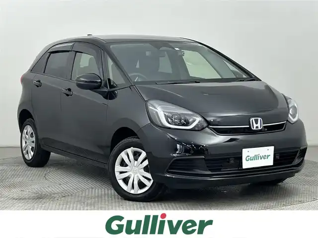 ホンダ フィット e:HEVホーム 道央・札幌 2023(令5)年 0.6万km クリスタルブラックパール ・4WD/・寒冷地仕様/・社外メモリナビ/・バックカメラ/・ドライブレコーダー/・SD/CD/USB/BT/フルセグTV/・衝突被害軽減ブレーキ/・レーンキープアシスト/・レーダークルーズコントロール/・LEDヘッドライト/・オートライト/・オートマチックハイビーム/・スマートキー/・スペアキー
