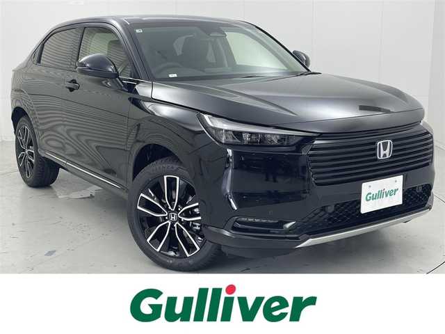 ホンダ ヴェゼル ハイブリッド e:HEV Z 茨城県 2025(令7)年 0.1千km クリスタルブラックパール 9インチHonda CONNECTディスプレー/・バックカメラ/・FM/AM/USB/Bluetooth/フルセグTV/・Apple CarPlay/Android　Auto/BSM/ワイヤレス受電/ビルドインETC2.0/パワーバックドア/ステアリングヒーター/運転席＆助手席シートヒーター/前後コーナーセンサー/Honda SENSING/・アダプティブクルーズコントロール/・誤発進抑制機能/・レーンキープアシスト/・近距離衝突軽減ブレーキ/パドルシフト/ハーフレザーシート/LEDヘッドライト/オートハイビーム/オートライト/オットマン