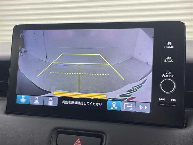 ホンダ ヴェゼル ハイブリッド e:HEV Z 茨城県 2025(令7)年 0.1千km クリスタルブラックパール 9インチHonda CONNECTディスプレー/・バックカメラ/・FM/AM/USB/Bluetooth/フルセグTV/・Apple CarPlay/Android　Auto/BSM/ワイヤレス受電/ビルドインETC2.0/パワーバックドア/ステアリングヒーター/運転席＆助手席シートヒーター/前後コーナーセンサー/Honda SENSING/・アダプティブクルーズコントロール/・誤発進抑制機能/・レーンキープアシスト/・近距離衝突軽減ブレーキ/パドルシフト/ハーフレザーシート/LEDヘッドライト/オートハイビーム/オートライト/オットマン