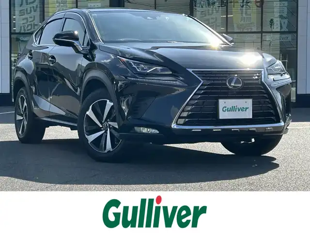 レクサス ＮＸ 300h バージョンL 岡山県 2019(令1)年 9.3万km グラファイトブラックガラスフレーク 登録時走行距離93041km/純正12.3インチナビ/フルセグTV(AM.FM.CD.DVD.TV.BT)/パノラミックビューモニター/ヘッドアップディスプレイ/ドライブレコーダー/シートヒーター/エアシート/ステアリングヒーター/クリアランスソナー/衝突軽減ブレーキ/レーダークルーズコントロール/レーンディパーチャーアラート/オートライト/オートマチックハイビーム/アイドリングストップ/パワーバックドア/18インチ純正AW/純正フロアマット/本革シート/全席パワーシート/３眼ＬＥＤライト