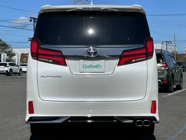 トヨタ アルファード S タイプゴールドⅡ 道央・札幌 2021(令3)年 2.8万km ホワイトパールクリスタルシャイン ４WD/モデリスタエアロ/純正ナビ/AM/FM/USB/BT/トヨタセーフティセンス/プリクラッシュセーフティ/横滑り防止装置/レーダークルーズコントロール/レーンキープアシスト/クリアランスソナー/ブラインドスポットモニター/パーキングサポートブレーキ/リアクロストラフィックアラート/ロードサインアシスト/バックカメラ/ビルトインETC2.0/ドライブレコーダー/アイドリングストップ/ECOMODE/デジタルインナーミラー/両側パワースライドドア/パワーバックドア/2列目オットマン/ハーフレザーシート/革巻きステアリング/ステアリングリモコン/AC100V/電動パーキング/ブレーキホールド/MTモード付AT/プッシュスタート/スマートキー/LEDヘッドライト/オートライト/フォグランプ/電動格納ミラー/ウィンカーミラー/フロアマット/ドアバイザー