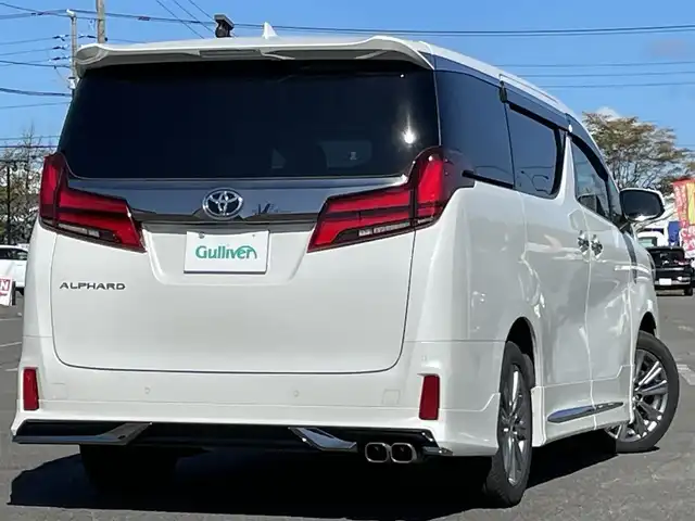 トヨタ アルファード S タイプゴールドⅡ 道央・札幌 2021(令3)年 2.8万km ホワイトパールクリスタルシャイン ４WD/モデリスタエアロ/純正ナビ/AM/FM/USB/BT/トヨタセーフティセンス/プリクラッシュセーフティ/横滑り防止装置/レーダークルーズコントロール/レーンキープアシスト/クリアランスソナー/ブラインドスポットモニター/パーキングサポートブレーキ/リアクロストラフィックアラート/ロードサインアシスト/バックカメラ/ビルトインETC2.0/ドライブレコーダー/アイドリングストップ/ECOMODE/デジタルインナーミラー/両側パワースライドドア/パワーバックドア/2列目オットマン/ハーフレザーシート/革巻きステアリング/ステアリングリモコン/AC100V/電動パーキング/ブレーキホールド/MTモード付AT/プッシュスタート/スマートキー/LEDヘッドライト/オートライト/フォグランプ/電動格納ミラー/ウィンカーミラー/フロアマット/ドアバイザー
