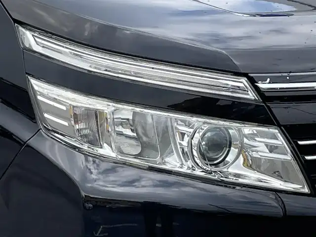 トヨタ ヴォクシー ZS 煌 佐賀県 2014(平26)年 12万km ブラック こちらは現金またはオートローンご利用時の価格です/自社ローンご希望の方は別途その旨お申付け下さい/禁煙車　/７人乗り　/エクリプスナビ ＴＶ ＢＴオーディオ ＤＶＤ ＣＤ　/バックカメラ　/両側電動スライドドア
