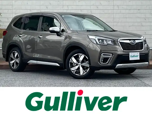 スバル フォレスター ハイブリッド アドバンス 滋賀県 2019(平31)年 2.2万km セピアブロンズM 純正8インチナビ/(AM/FM/CD/DVD/iPod/USB/BT/SD/フルセグTV)/ハーフレザーシート/パワーバックドア/アイサイトver.3/・衝突軽減ブレーキ/・レーントレーシングアシスト/・レーダークルーズコントロール/コーナーセンサー/電動サイドブレーキ/シートヒーター/パワーシート/サイドビュー＆バックカメラ/ドライブレコーダー/ビルトインETC/ステアリングヒーター/革巻きステアリング/ステアリングスイッチ/パドルシフト/電動サイドブレーキ/横滑り防止装置/プッシュスタート/純正フロアマット/電格ウインカーミラー