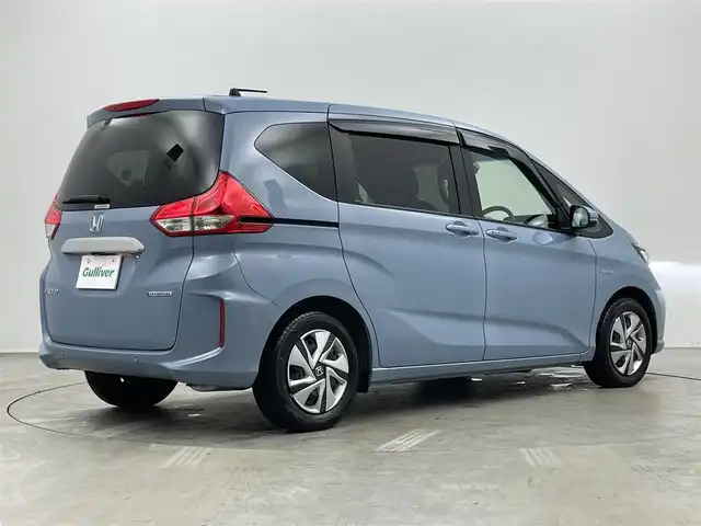 ホンダ フリード ハイブリット G ホンダセンシング 埼玉県 2022(令4)年 0.8万km シーグラスブルーパール 純正９インチナビ　バックカメラ　ビルトインＥＴＣ２．０　前後ドライブレコーダー　ホンダセンシング　アダプティブクルーズコントロール　シートヒーター　オートライト　ＬＥＤヘッドライト　地デジフルセグ