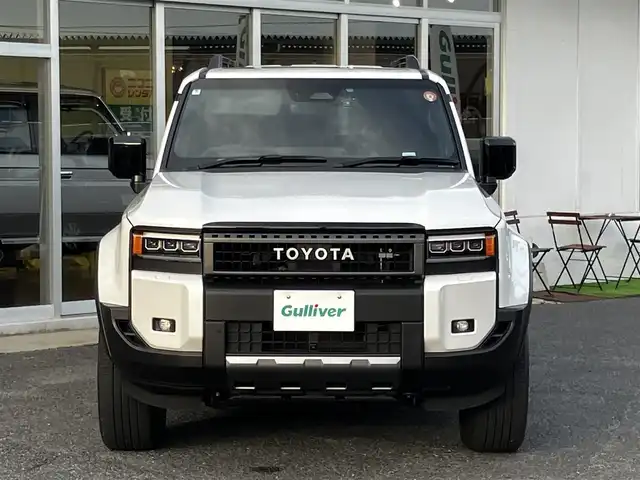 トヨタ ランドクルーザー ２５０ ZX 山口県 2024(令6)年 0.9万km プラチナホワイトパールマイカ ワンオーナー/サンルーフ/茶レザーシート/シートベンチレーション/シートヒーター/パワーシート/純正ナビ・フルセグTV・BT/パノラミックビューカメラ/JBLプレミアムサウンド/デジタルインナーミラー/前後ドライブレコーダー/カラーヘッドアップディスプレイ/ステアリングヒーター/ルーフレール/パワーバックドア/LEDオートライト/LEDフォグ/ETC2.0/スマートキー/プリクラッシュセーフティ/レーダークルーズコントロール