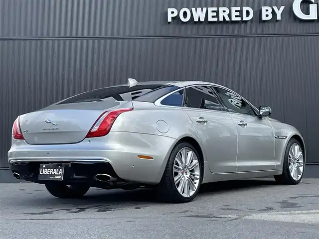 ジャガー ＸＪ プレミアムラグジュアリー 長野県 2018(平30)年 2.6万km ゴールド サンルーフ/ブラウンレザーシート/D/Nベンチレーション/全席シートヒーター/MERIDIANサウンド/デジタルメーター/ACC(アダプティブクルーズコントロール)/純正ナビゲーション/フルセグテレビ/360°カメラ/20インチOPアルミ/インテリジェントエマージェンシーブレーキ/LEDヘッドライト/オートトランク/スマートキー/パーキングアシスト/パークセンサー/カラーコード：１AJ（INGOT）