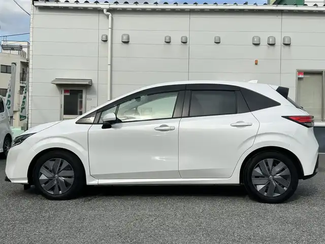 日産 ノート X 兵庫県 2023(令5)年 2万km ピュアホワイトパール /ワンオーナー/・車検R10年1月まで/・OP LEDヘッドランプ（アダプティブLEDヘッドライトシステム）/【セットオプション】//プロパイロット（ナビリンク機能付）//プロパイロット緊急停止支援システム（SOSコール機能）//NISSAN CONNECTナビ（9インチ）//インテリジェントアラウンドビューモニター//インテリジェントルームミラー//ステアリングスイッチ（アドバンスドドライブアシストディスプレイ）//インテリジェントBSI（後側方衝突防止支援システム）//BSW（後側方車両検知警報）//RCTA（後退時車両検知警報）//ワイヤレス充電器//ETCユニット（ビルトインタイプ）/・地デジ/BT/USB/HDMI/Apple Car Play/・ドライブレコーダー/・ハンドル支援/・車線逸脱警報/・車線逸脱防止支援/・エマージェンシーブレーキ/・速度標識表示/・前後ソナー/・標識検知支援/・ハイビームアシスト/・R6/7年ディーラー点検記録簿
