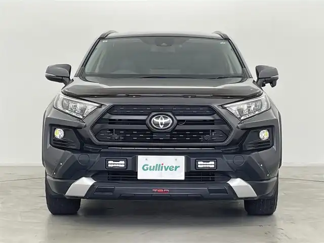 トヨタ ＲＡＶ４ アドベンチャー 群馬県 2019(令1)年 6.5万km グレーメタリック TRDフロントロアガーニッシュ/TRDフロントバンパーガーニッシュ(LED付)/TRDバックドアガーニッシュ/TRDバックドアロアガーニッシュ/TRDマッドフラップ/リヤクロストラフィックオートブレーキ(パーキングサポートブレーキ/後方接近車両)/ブラインドスポットモニター（BSM）/ステアリングヒーター/快適温熱シート/シートベンチレーション/＝＝＝＝＝/carrozzeria8インチナビ(AVIC-RQ902)/・AM/FM/CD/DVD/Bluetooth/フルセグTV/前方ドライブレコーダー/合皮シート/前席パワーシート/ETC/ダウンヒルアシストコントロール/LEDヘッドライト/サイドカメラ/電動パーキングブレーキ/オートブレーキホールド/スマートキー/プッシュスタート