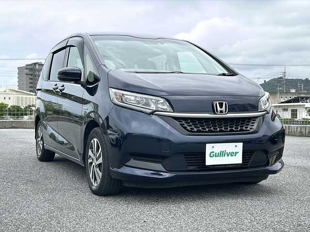 ホンダ フリード ハイブリット G ホンダセンシング 沖縄県 2020(令2)年 6.3万km ミッドナイトブルービームM 純正9型ナビ/　（AM/FM/CD/DVD/BT）/フルセグTV/バックモニター/ホンダセンシング/レーダークルーズコントロール/両側パワスラ/ハーフレザーシート/シートヒーター/LEDヘッドライト/オートライト/純正フロアマット/純正15インチAW/ETC