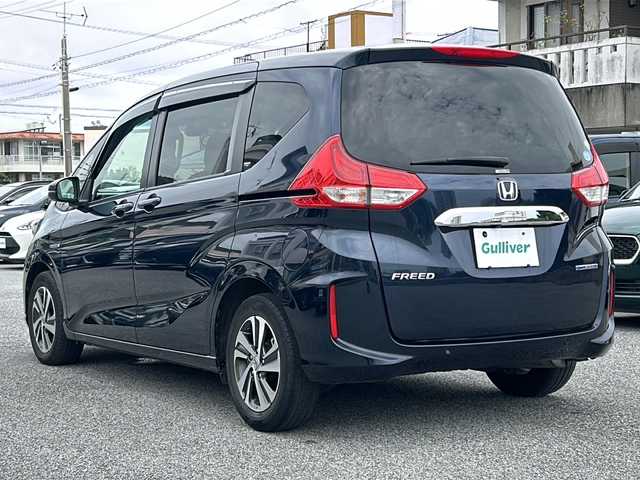 ホンダ フリード ハイブリット G ホンダセンシング 沖縄県 2020(令2)年 6.3万km ミッドナイトブルービームM 純正9型ナビ/　（AM/FM/CD/DVD/BT）/フルセグTV/バックモニター/ホンダセンシング/レーダークルーズコントロール/両側パワスラ/ハーフレザーシート/シートヒーター/LEDヘッドライト/オートライト/純正フロアマット/純正15インチAW/ETC
