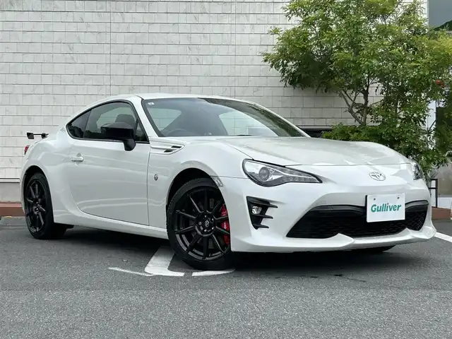 トヨタ ８６ GT リミテッド ブラックPKG 愛媛県 2019(令1)年 5.2万km クリスタルホワイトパール ワンオーナー/6速MT/brembo製ディスクブレーキ/純正ナビ/・Bluetooth/・CD/フルセグTV/バックカメラ/ETC/プッシュスタート/クルーズコントロール/横滑り防止機能/純正フロアマット/ハーフレザーシート/シートヒーター/革巻きステアリング/スマートキー/LEDヘッドライト/オートライト/オートマチックハイビーム