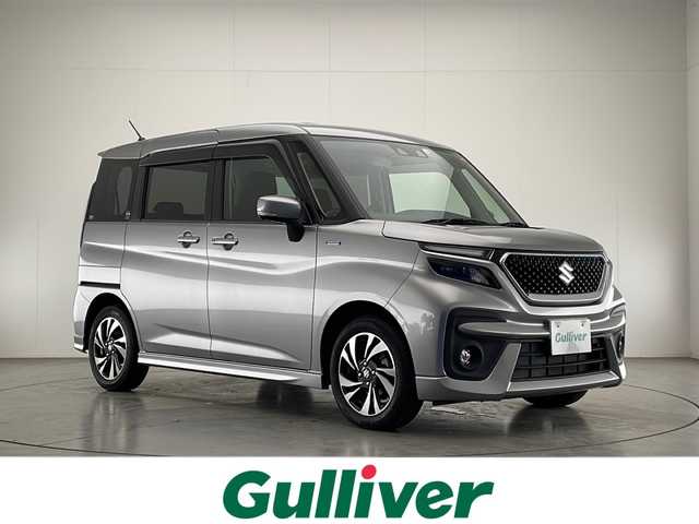 スズキ ソリオ バンディット HV MV 宮崎県 2022(令4)年 1万km プレミアムシルバーメタリック 禁煙車/衝突被害軽減ブレーキ/純正LEDオートライト/純正LEDフォグ/純正15インチアルミ/純正エアロ/純正ルーフエンドスポイラー/純正セキュリティアラーム/純正フロアマット/左側電動スライドドア/アダプティブクルーズコントロール/レーンディパーチャーアラート/クリアランスソナー/ヘッドアップディスプレイ/前席シートヒーター/オートエアコン/本革巻ハンドル/ウインカードアミラー/スマートキー/プッシュエンジンスタート/新車時保証書/取扱い説明書