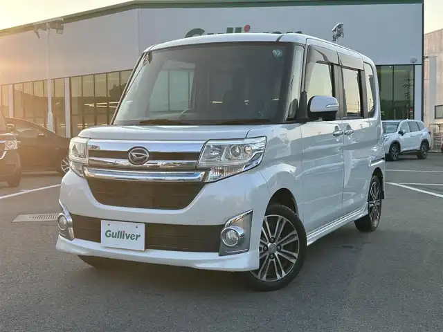 ダイハツ タント カスタム RS 愛媛県 2014(平26)年 7.4万km パールホワイトⅢ 禁煙車/登録時走行距離：73977km/ワンオーナー/純正ナビ/BT/フルセグTV/両側パワースライドドア/ビルトインETC/LEDヘッドランプ/オートライト/オートエアコン/本革巻きステアリング/ステアリングスイッチ/純正アルミホイール/プッシュボタンスタート/イモビライザー/アルパインツイータ