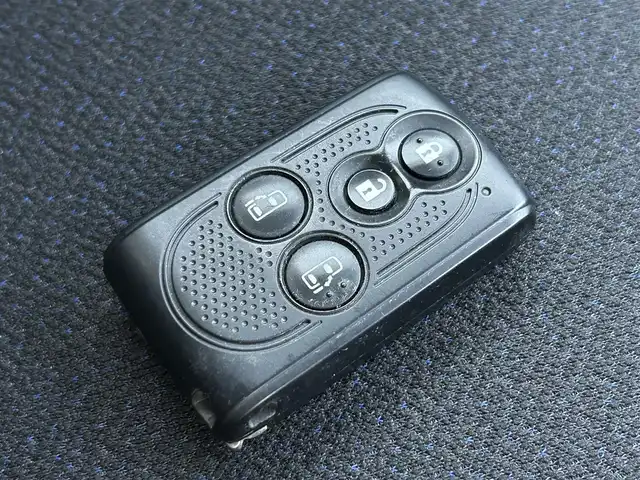 ダイハツ タント カスタム RS 愛媛県 2014(平26)年 7.4万km パールホワイトⅢ 禁煙車/登録時走行距離：73977km/ワンオーナー/純正ナビ/BT/フルセグTV/両側パワースライドドア/ビルトインETC/LEDヘッドランプ/オートライト/オートエアコン/本革巻きステアリング/ステアリングスイッチ/純正アルミホイール/プッシュボタンスタート/イモビライザー/アルパインツイータ