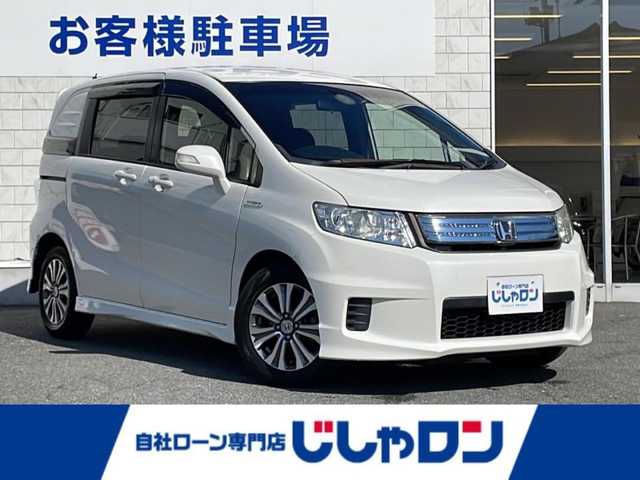 ホンダ フリード スパイク ハイブリット ジャストセレクション 山口県 2012(平24)年 6.7万km プレミアムホワイトパール (株)IDOMが運営する【じしゃロン宇部店】の自社ローン専用車両になります。こちらは現金またはオートローンご利用時の価格です。自社ローンご希望の方は別途その旨お申付け下さい。/純正ナビ/バックモニター/両側パワースライドドア/ＥＴＣ/ＨＩＤヘッドライト/ハーフレザーシート/ドライブレコーダー/クルーズコントロール/純正フロアマット/純正15インチアルミホイール