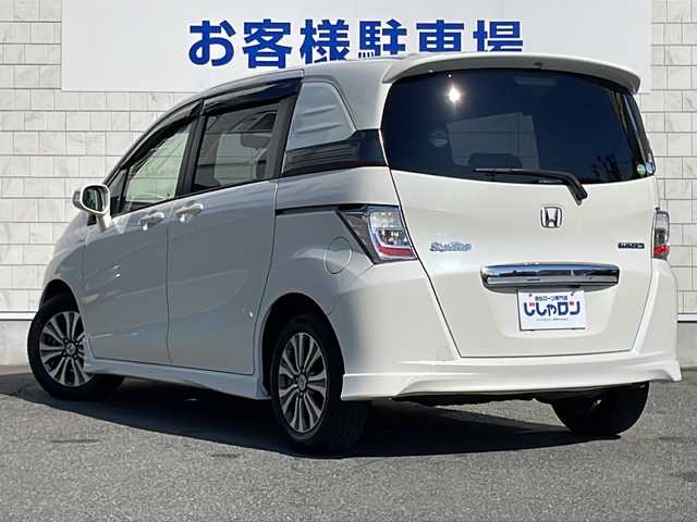 ホンダ フリード スパイク ハイブリット ジャストセレクション 山口県 2012(平24)年 6.7万km プレミアムホワイトパール (株)IDOMが運営する【じしゃロン宇部店】の自社ローン専用車両になります。こちらは現金またはオートローンご利用時の価格です。自社ローンご希望の方は別途その旨お申付け下さい。/純正ナビ/バックモニター/両側パワースライドドア/ＥＴＣ/ＨＩＤヘッドライト/ハーフレザーシート/ドライブレコーダー/クルーズコントロール/純正フロアマット/純正15インチアルミホイール