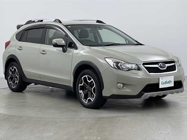 スバル インプレッサ ＸＶ 2．0i－L 道央・札幌 2014(平26)年 10.6万km デザートカーキ ・4WD/・社外SDナビ/　CD/DVD/BT/SD/・フルセグTV/・クルーズコントロール/・前席パワーシート/・ルーフレール/・ETC/・革巻ステアリング/・パドルシフト/・ステアリングリモコン/・オートライト/・HIDヘッドライト/・フォグランプ/・リアフォグランプ/・アイドリングストップ/・プッシュスタート/・社外ドライブレコーダー前後/・ドアバイザー/・純正フロアマット/・純正17インチアルミホイール/・積込タイヤ/・保証書