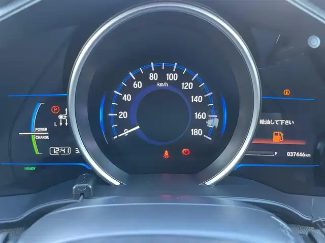 ホンダ フィット ハイブリット Lパッケージ 島根県 2015(平27)年 3.8万km ミラノレッド 純正８型メモリナビ　/フルセグＴＶ　/ＤＶＤ再生　/Ｂｌｕｅｔｏｏｔｈ　/バックカメラ　/ＥＴＣ　/クルーズコントロール/ドライブレコーダー/衝突軽減システム　/盗難防止装置　/アイドリングストップ　/純正LEDライト　/オートライト/純正フロアマット