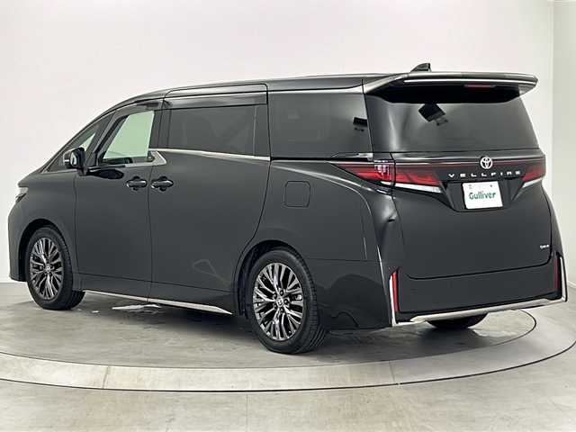 トヨタ ヴェルファイア ハイブリット Z プレミア 大阪府 2024(令6)年 2.2万km ブラック ワンオーナー/純正14インチナビ/・フルセグTV/・Bluetooth/・USB接続/純正13.2インチ後席モニター/ユニバーサルステップ/パノラマミックビューモニター/3眼LEDヘッドライト/シグネイチャーイルミブレード/イルミルーフスポイラー/左右対称ムーンルーフ/デジタルインナーミラー/ウェルカムライト/パワーバックドア/両側パワースライドドア/トヨタセーフティセンス/ブラインドスポットモニター/衝突軽減システム/レーンキープアシスト/レーダークルーズコントロール/ヘッドアップディスプレイ/置くだけ充電/シートヒーター/シートベンチレーション/保証書/取扱説明書/点検記録簿