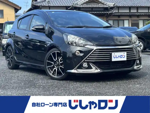 トヨタ アクア 宮崎県 2015(平27)年 11.5万km ブラックマイカ /ナビ(MAX675)//ワンセグ/CD/DVD//ETC//クルーズコントロール//ハーフレザーシート//純正フロアマット//純正アルミホイール//ドアバイザー//オートライト//フォグライト