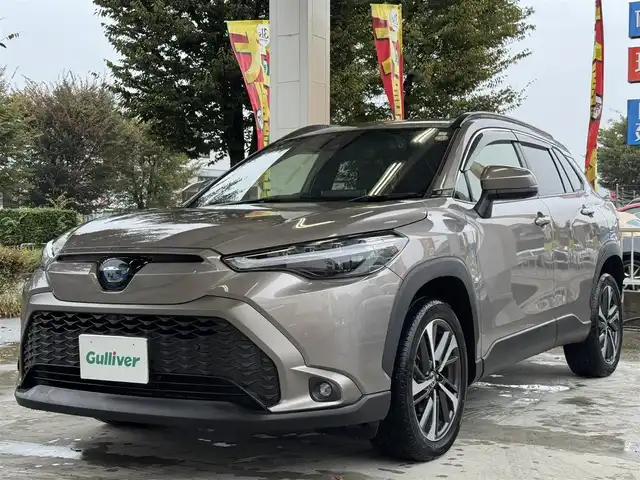 トヨタ カローラ クロス ハイブリッド Z 兵庫県 2023(令5)年 1.6万km アバンギャルドブロンズメタリック ワンオーナー/純正ナビ/全方位カメラ/フルセグTV/Bluetooth接続可/DVD再生可/ビルトインETC2.0/前後ドラレコ/黒ハーフレザーシート/前2席シートヒーター/純正アルミホイール/LEDヘッドライト/AUTOライト/LEDフォグライト/パワーバックドア/ステアリングリモコン/トヨタセーフティセンス/レーダークルーズコントロール/ブラインドスポットモニター/スマートキー×2/プッシュスタート/ハイビームアシスト/レーンキープアシスト