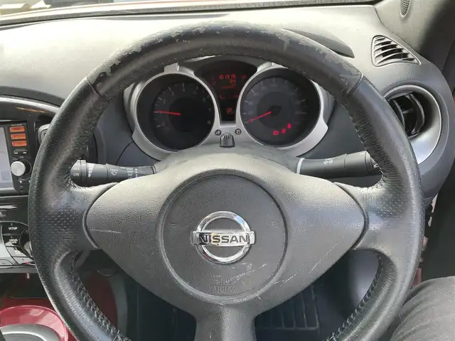 日産 ジューク 15RX タイプV 佐賀県 2013(平25)年 10.2万km ラディアントレッド 純正SDナビゲーション/・フルセグTV/CD/SD/AUX/バックカメラ/アイドリングストップ/横滑り防止装置/ISOFIX対応/革巻きステアリング/純正フォグランプ/純正フロアマット/純正ドアバイザ―/新車保証書/取扱説明書/スペアキー１本