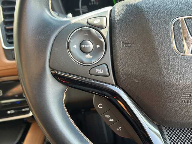 ホンダ ヴェゼル ハイブリッド Z ホンダセンシング 兵庫県 2019(令1)年 6.8万km プラチナホワイトパール 純正ギャザーズナビ【CD/DVD/TV】/ハーフレザーシート/バックカメラ/純正１７インチアルミ/プッシュスタート/ホンダセンシング【衝突軽減ブレーキ】/ルーフレール/パドルシフト/シートヒーター/レーンキープアシスト/オートクルーズコントロール【追従あり】/ACC先行車検知音/先行車発信お知らせ/リアクティブフォースペダル/標識認識機能/ビルトインETC/ブレーキホールド