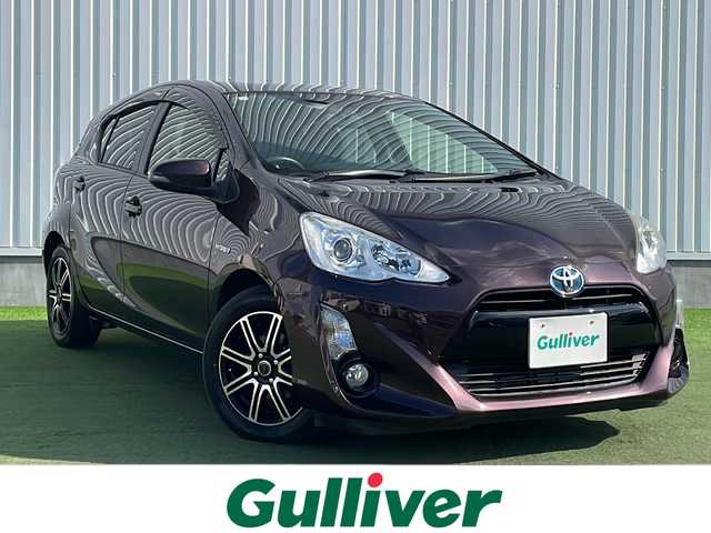 トヨタ アクア G 香川県 2015(平27)年 2.6万km ディープアメジストマイカメタリック 7型メモリナビ/・フルセグTV/・CD/DVD/・Bluetooth/バックカメラ/15インチ純正アルミホイール/プッシュスタート/スマートキー/パワーステアリング/パワーウィンドウ/革巻きステアリング/ステアリングリモコン/アイドリングストップ/オートエアコン/クルーズコントロール/純正フロアマット/ABS/横滑り防止装置/オートライト/LEDヘッドライト/ヘッドライトレベライザー/電動ウィンカーミラー/Wエアバック