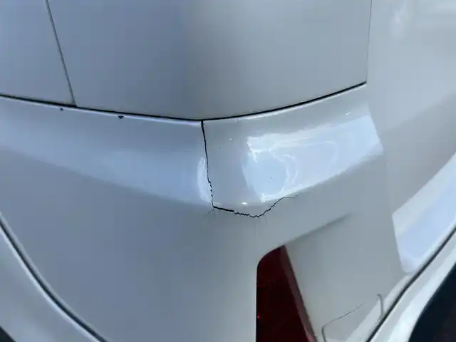 トヨタ ヴォクシー ハイブリッド ZS 煌 岡山県 2018(平30)年 9.9万km ホワイトパールクリスタルシャイン 登録時走行距離98348km/TRDエアロ/純正9インチナビ/フルセグTV(AM.FM.CD.DVD.TV.BT)/両側パワースライドドア/バックカメラ/ETC/シートヒーター/クリアランスソナー/衝突軽減ブレーキ/横滑り防止装置/クルーズコントロール/車線逸脱警報（レーンキープアシスト）/オートライト/オートマチックハイビーム/アイドリングストップ/16インチ純正AW/純正フロアマット/スペアキー/LEDヘッドライト/取扱説明書