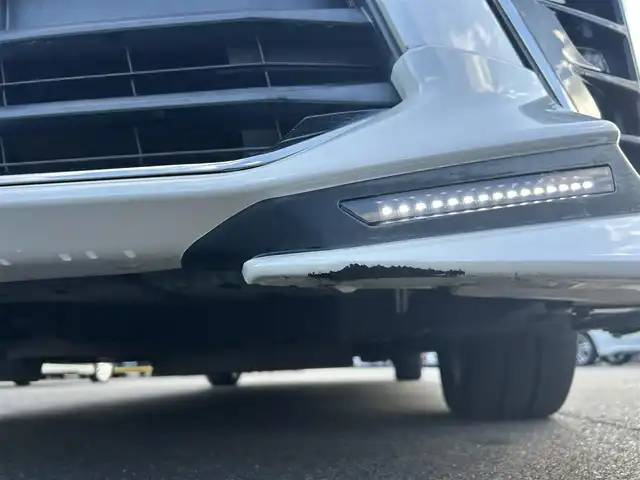 トヨタ ヴォクシー ハイブリッド ZS 煌 岡山県 2018(平30)年 9.9万km ホワイトパールクリスタルシャイン 登録時走行距離98348km/TRDエアロ/純正9インチナビ/フルセグTV(AM.FM.CD.DVD.TV.BT)/両側パワースライドドア/バックカメラ/ETC/シートヒーター/クリアランスソナー/衝突軽減ブレーキ/横滑り防止装置/クルーズコントロール/車線逸脱警報（レーンキープアシスト）/オートライト/オートマチックハイビーム/アイドリングストップ/16インチ純正AW/純正フロアマット/スペアキー/LEDヘッドライト/取扱説明書